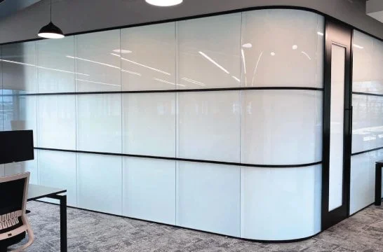 Switchable glass in opaque/privacy mode (546×360 px) — shows the "frosted at a switch" concept in a real interior.