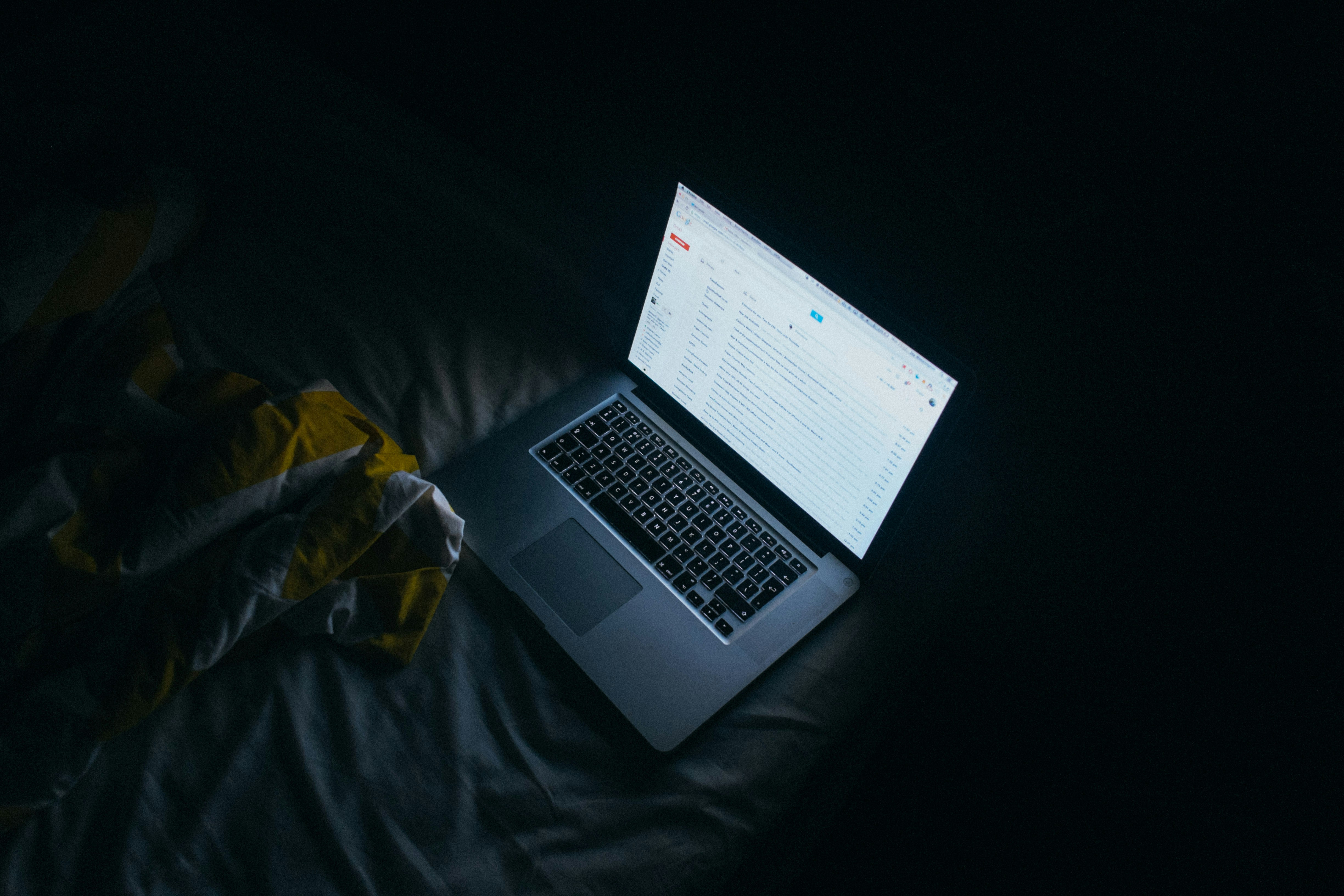 Cover — A glowing screen in a dark, quiet room