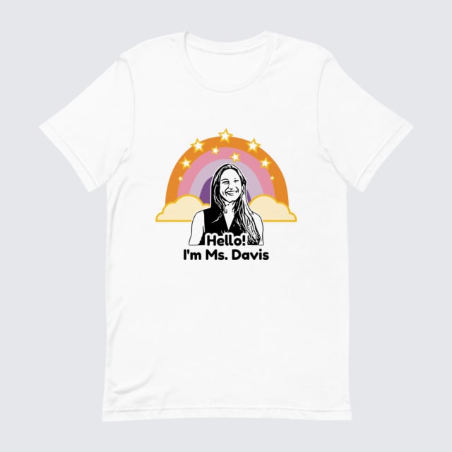 Introduce yourself in style with our Personalized Teacher Face Tee. Customized with your portrait and name, Ms. Davis, it’s the perfect way to break the ice on the first day of class. Crafted for comfort and durability, it’s sure to become your favorite teaching attire!