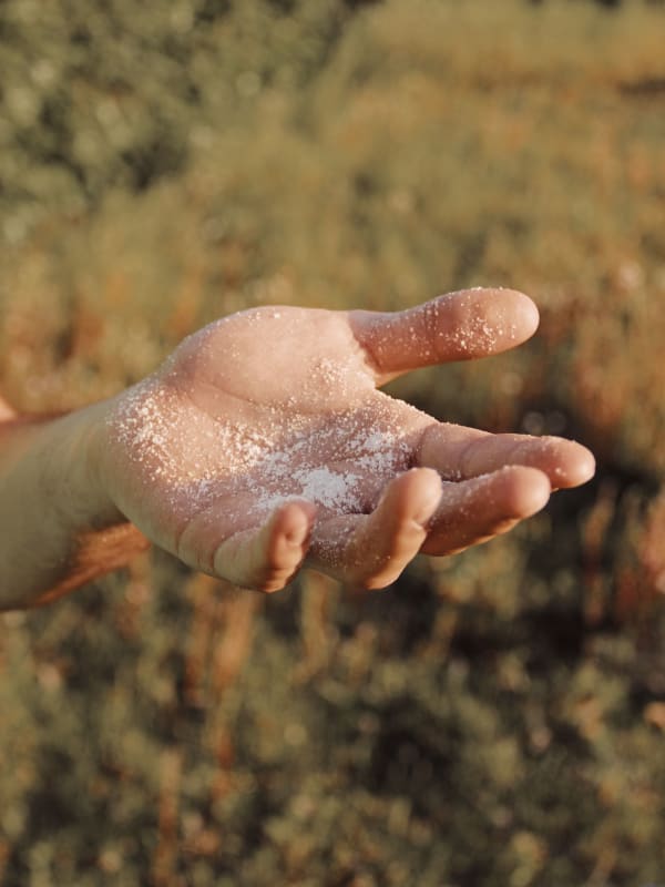 Hand Extended Holding Salt