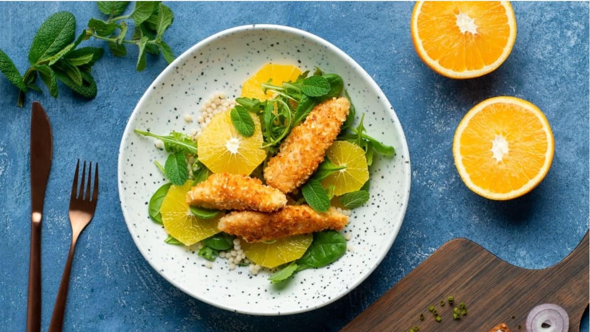 Vista ar pērļu kuskusu un apelsīniem