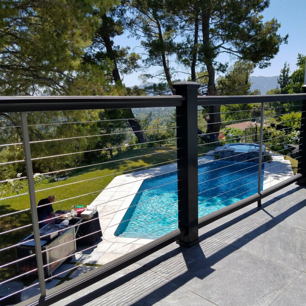 Cable railing along an elevated walkway