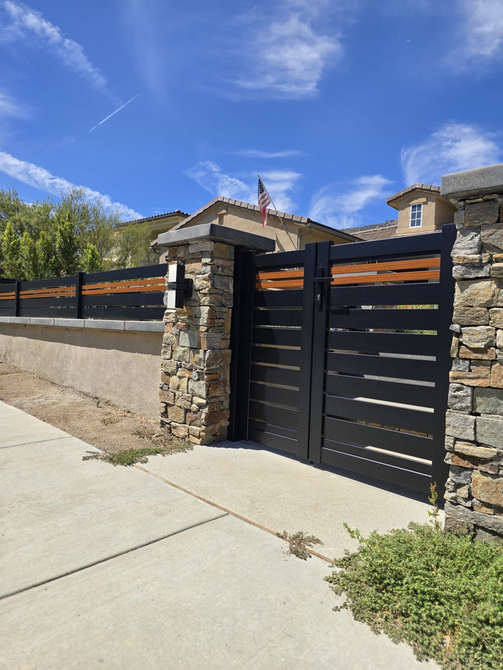 Horizontal black aluminum semi-privacy fence
