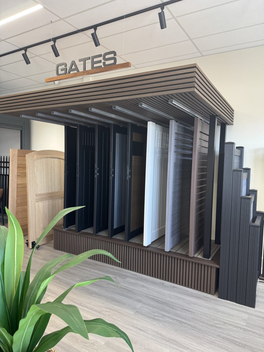 Gates section of the Rosemead showroom with full-height gate panels on rails