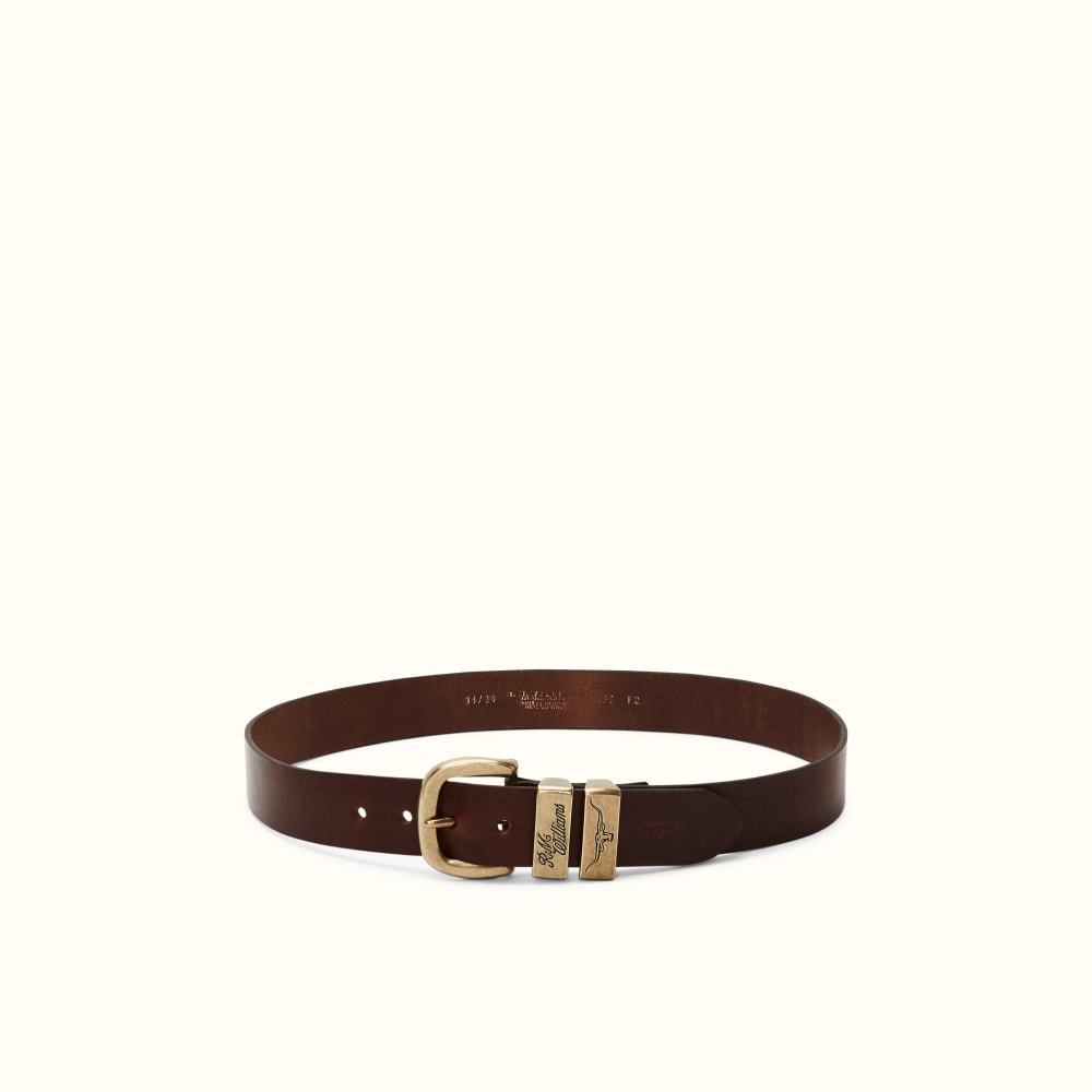 Black leather belt with brass buckle by Butts and Shoulders