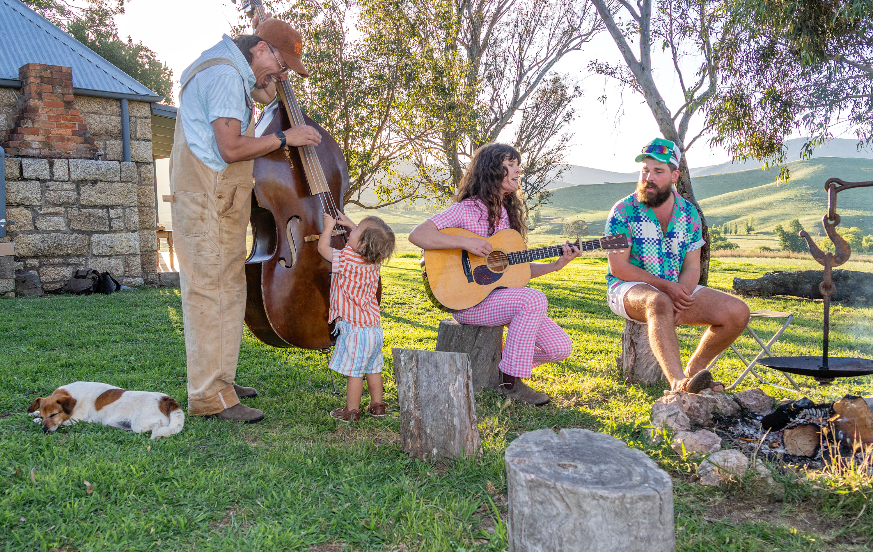 A family singalong around the fire.