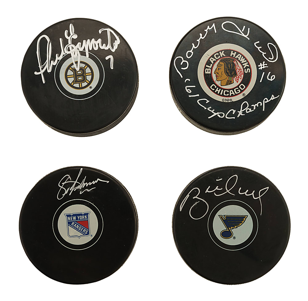 Hall of Fame and Stars Signed Hockey Puck Collection (17) Including Eric Lindros, Phil Esposito, and Bobby Hull