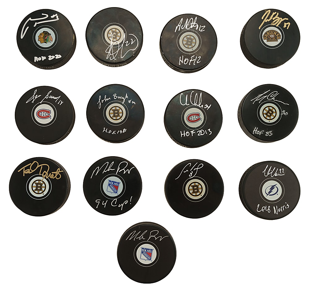 Hall of Fame and Stars Signed Hockey Puck Collection (17) Including Eric Lindros, Phil Esposito, and Bobby Hull