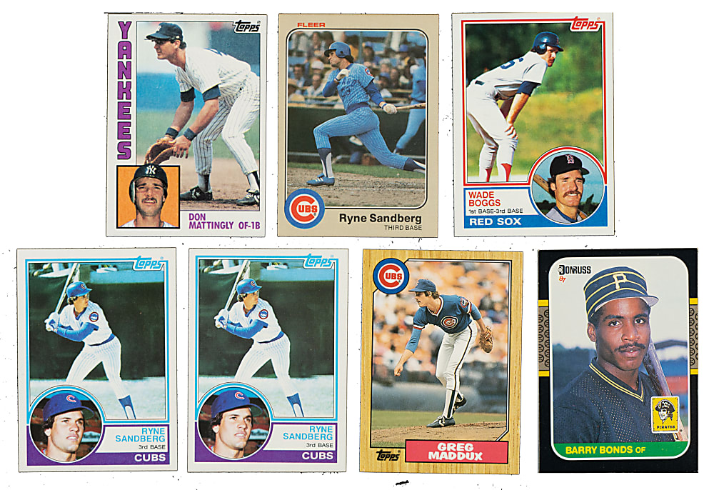 1983 to 1987 Topps, Fleer, and Donruss Hall of Fame and Star Rookie Collection (7) Including Don Mattingly, Wade Boggs, and Greg Maddux