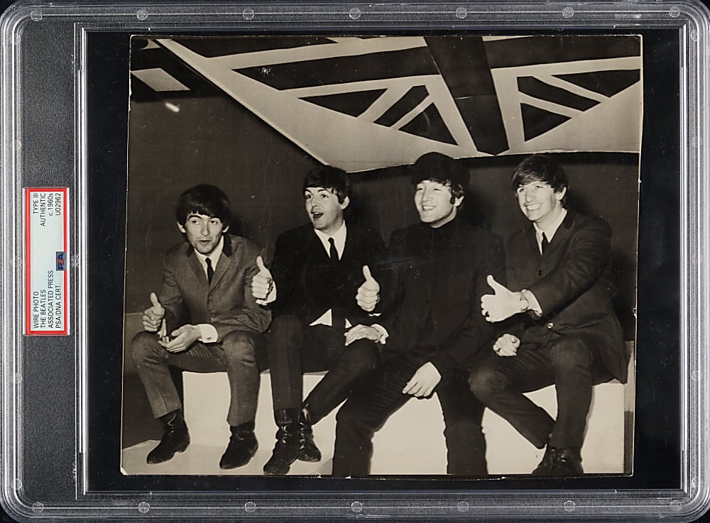 Circa 1960s Beatles Signed Associated Press Wire Photograph PSA/DNA Type III