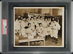 1936 World Champions New York Yankees Team with Lou Gehrig and Rookie Joe DiMaggio Signing Baseballs Original Associated Press Photograph PSA/DNA Type I