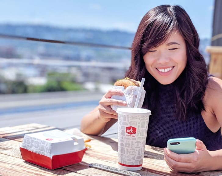 Jesi, Roboboogie Producer, enjoying Jack in the Box on the rooftop deck