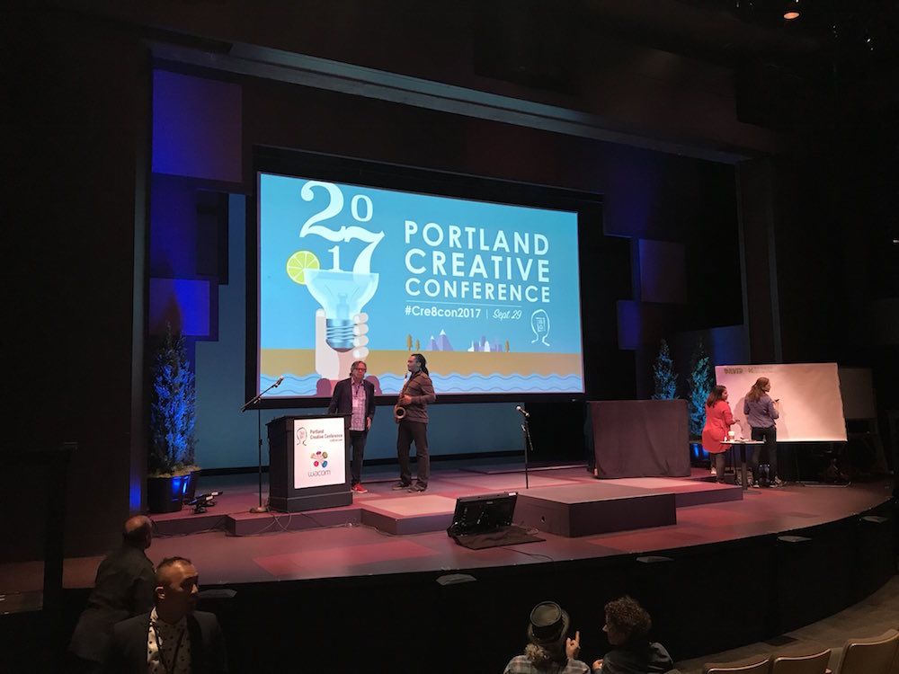 Portland Creative Conference - Speaker in front of audience