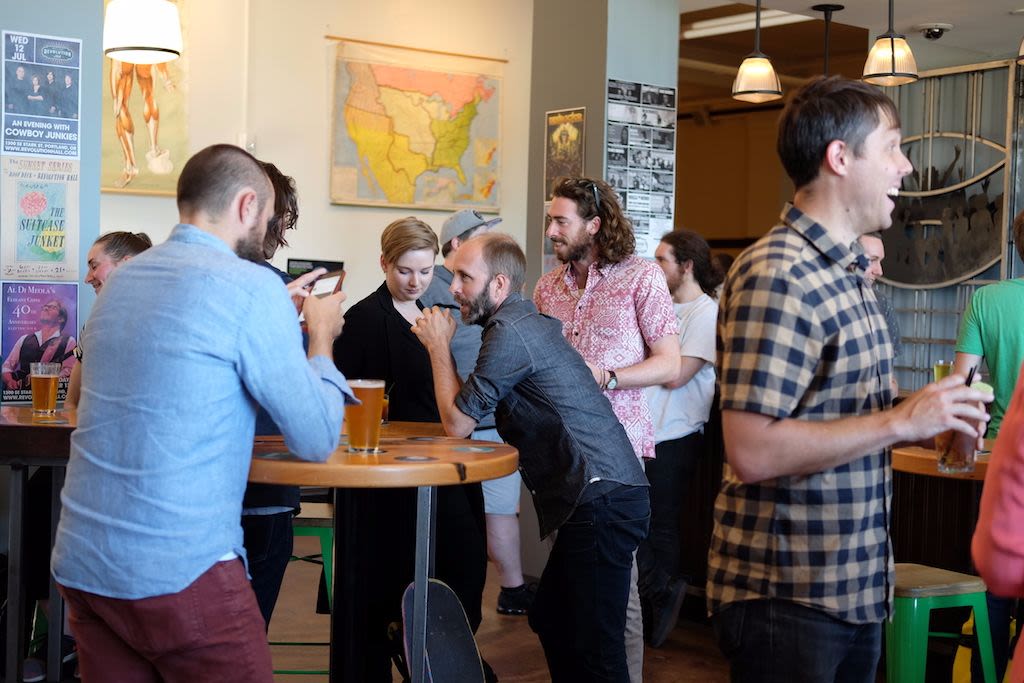 Photo of Camp O guests networking