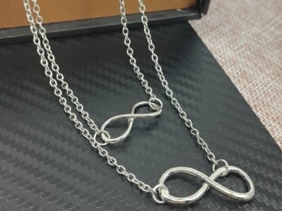 Multilayer necklace, with infinity symbol pendants, silver plated