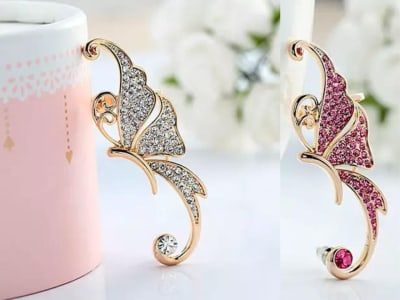 Solitaire climbing ear cuff earring, in the shape of a butterfly, encrusted with ...