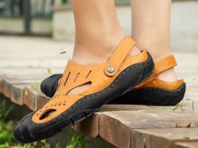 Men's leather sandals with closed toe and heel strap