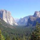 View of a valley stretching through carved out granite mountains in Yosemite National Park