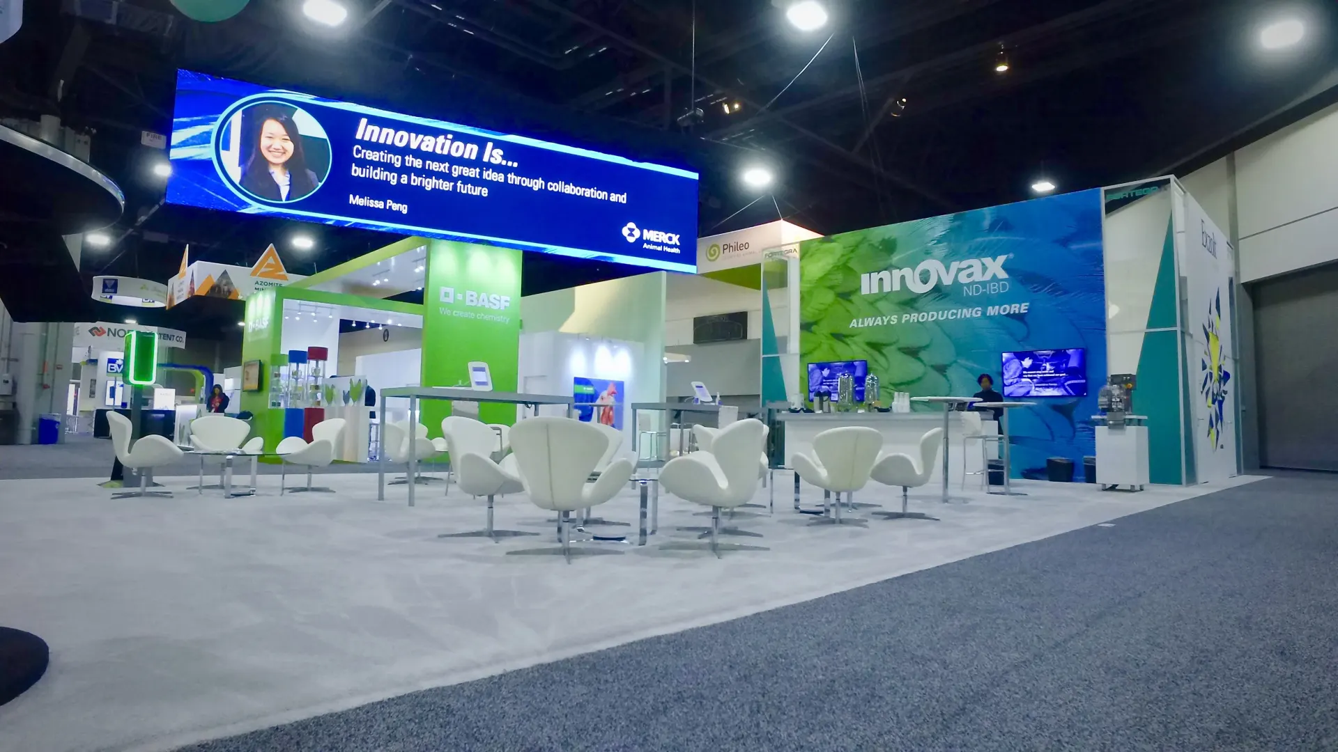 Trade show booth with professional lighting and LED display