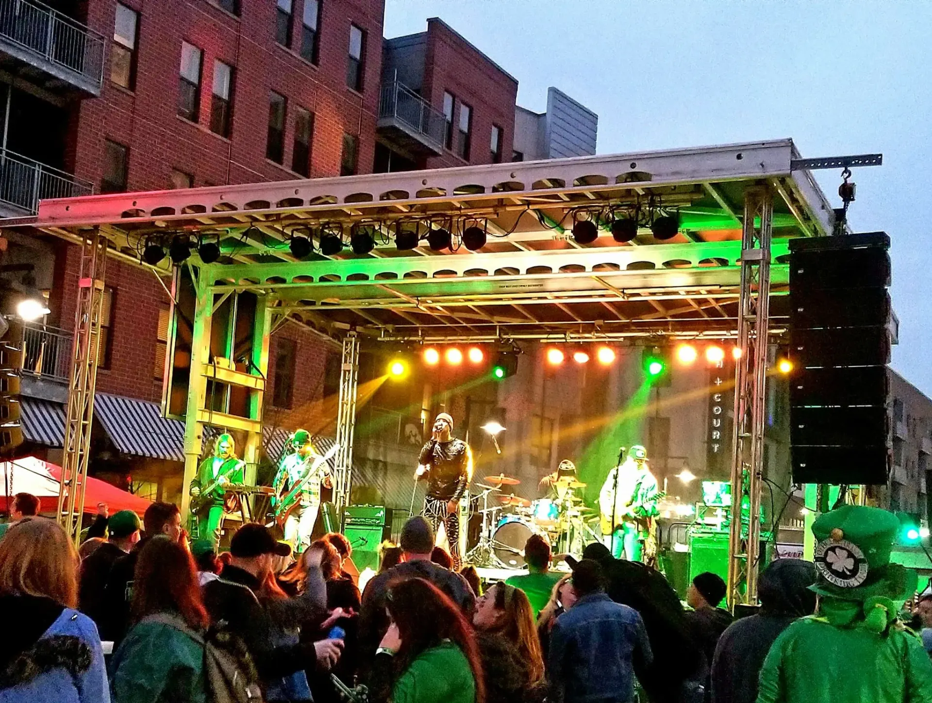 APEX 2420 mobile stage with band and concert lighting