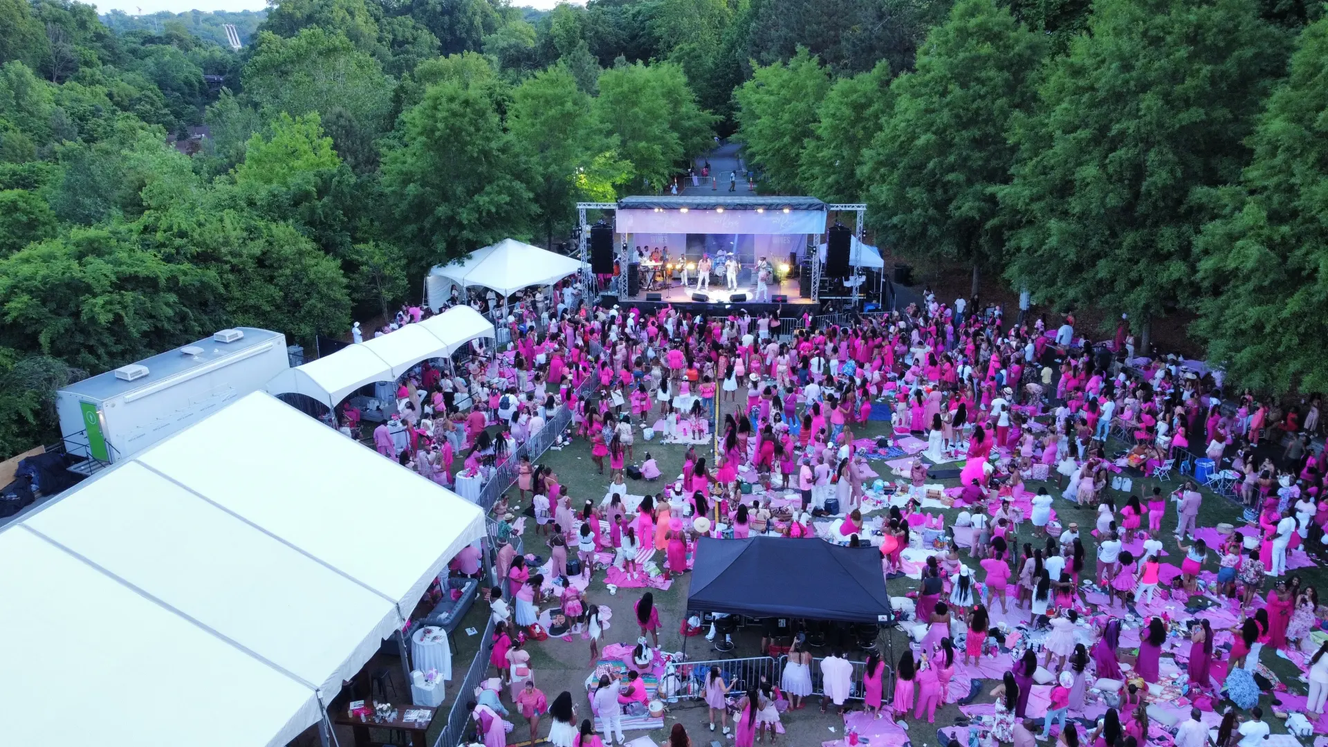 Celebrez En Rose festival stage with concert lighting
