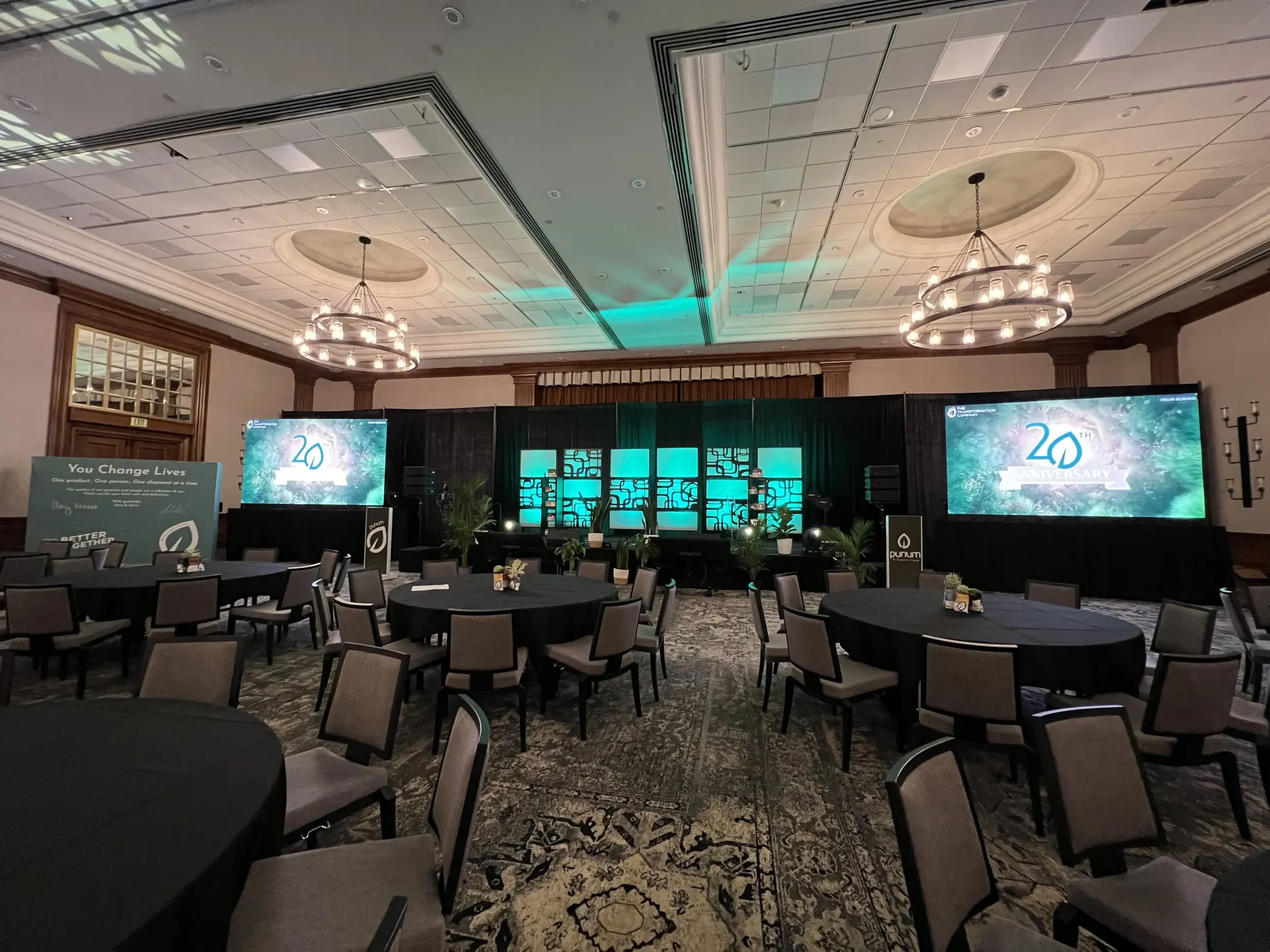 Corporate product launch event with LED video walls and dramatic lighting for product reveal