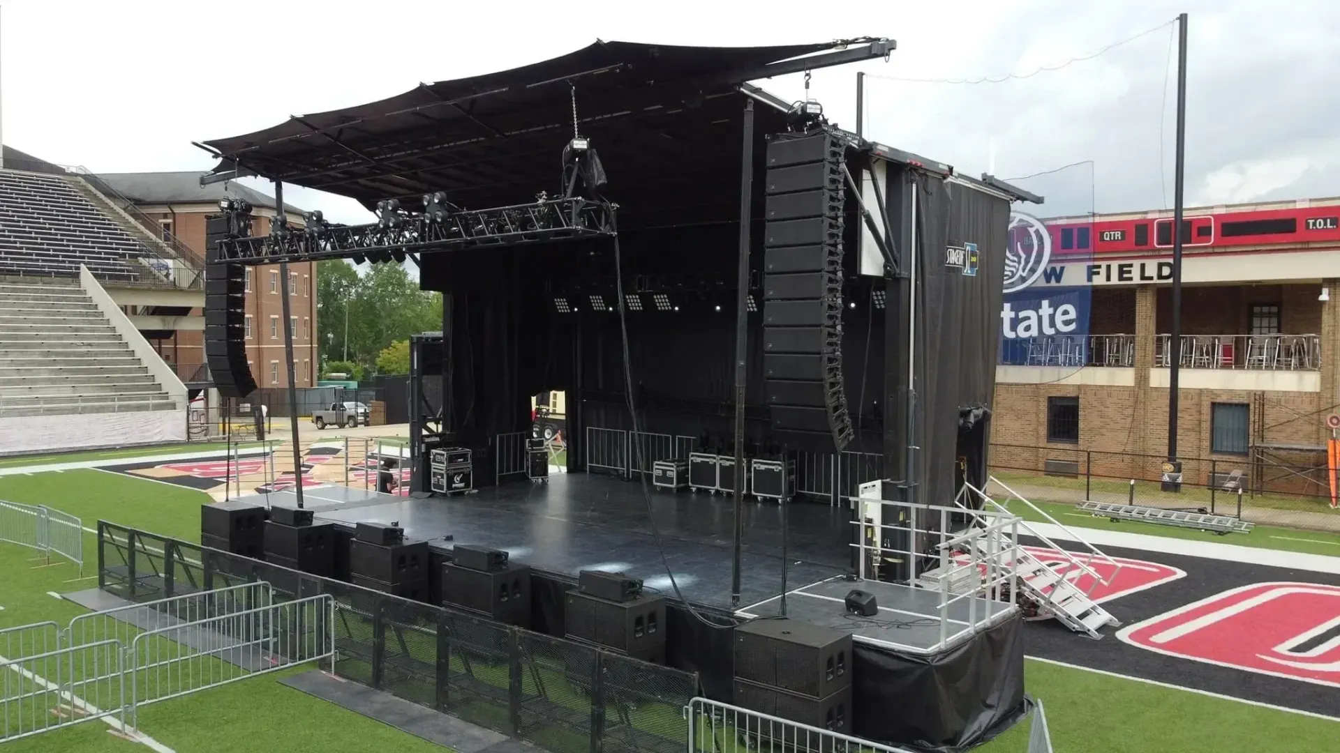 SL260 front line array and lighting at festival setup
