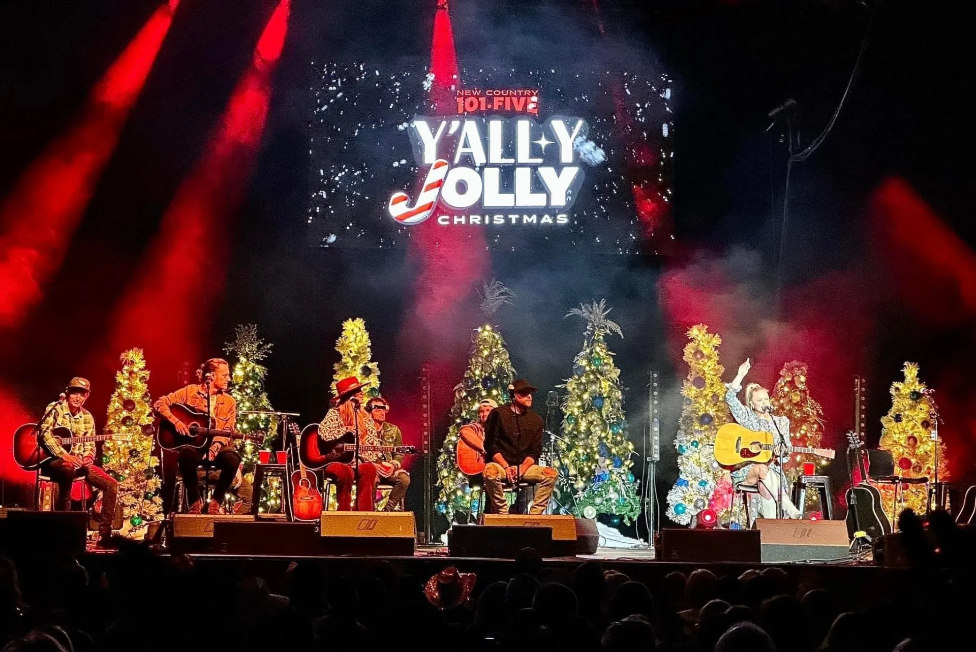 Indoor arena show with multi-zone lighting and LED walls