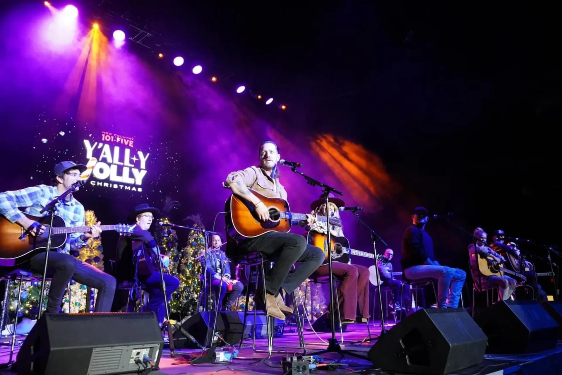 Wide arena view with stage and suspended audio arrays