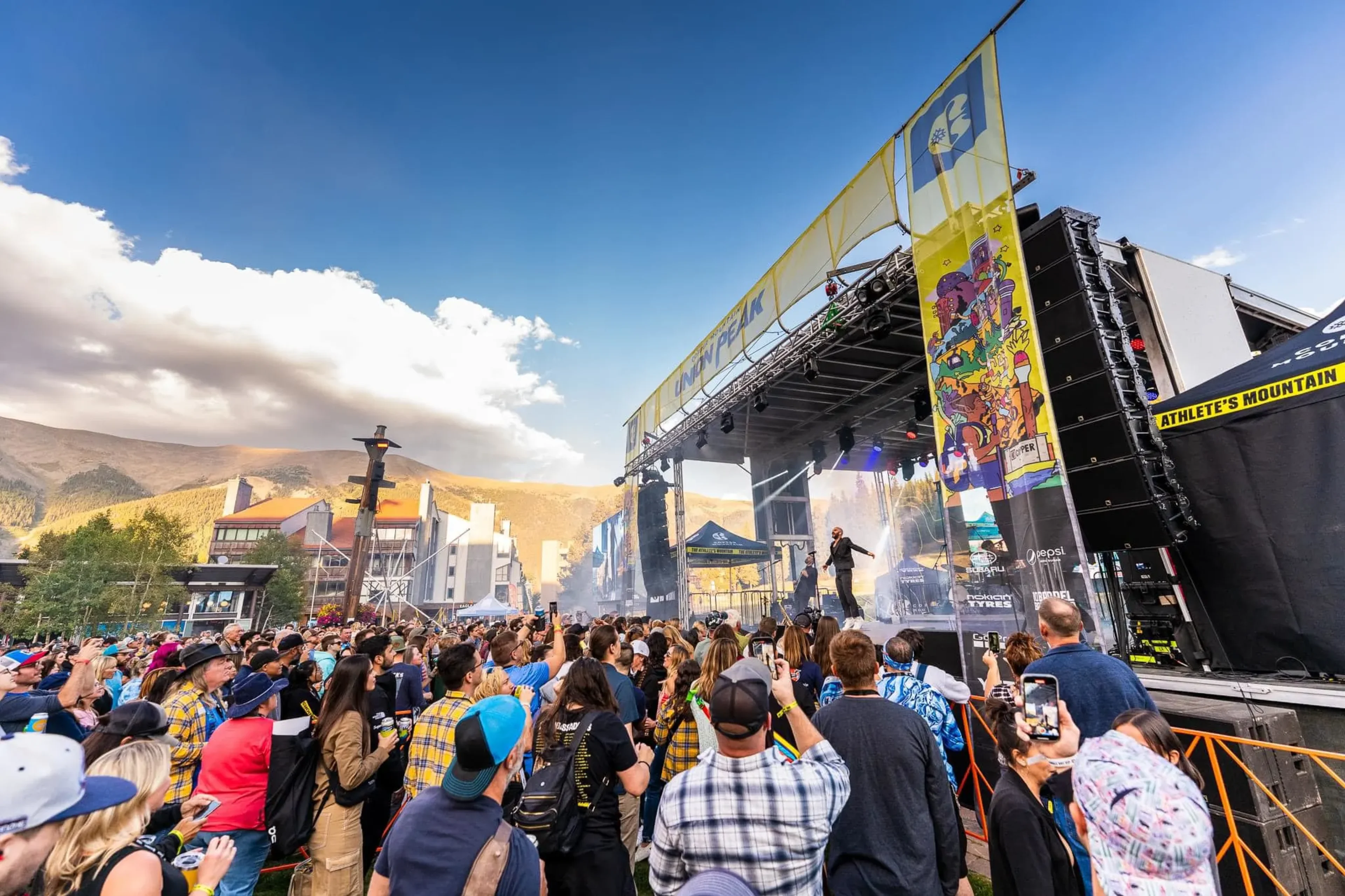 APEX 3224 mobile stage side view with live concert performer