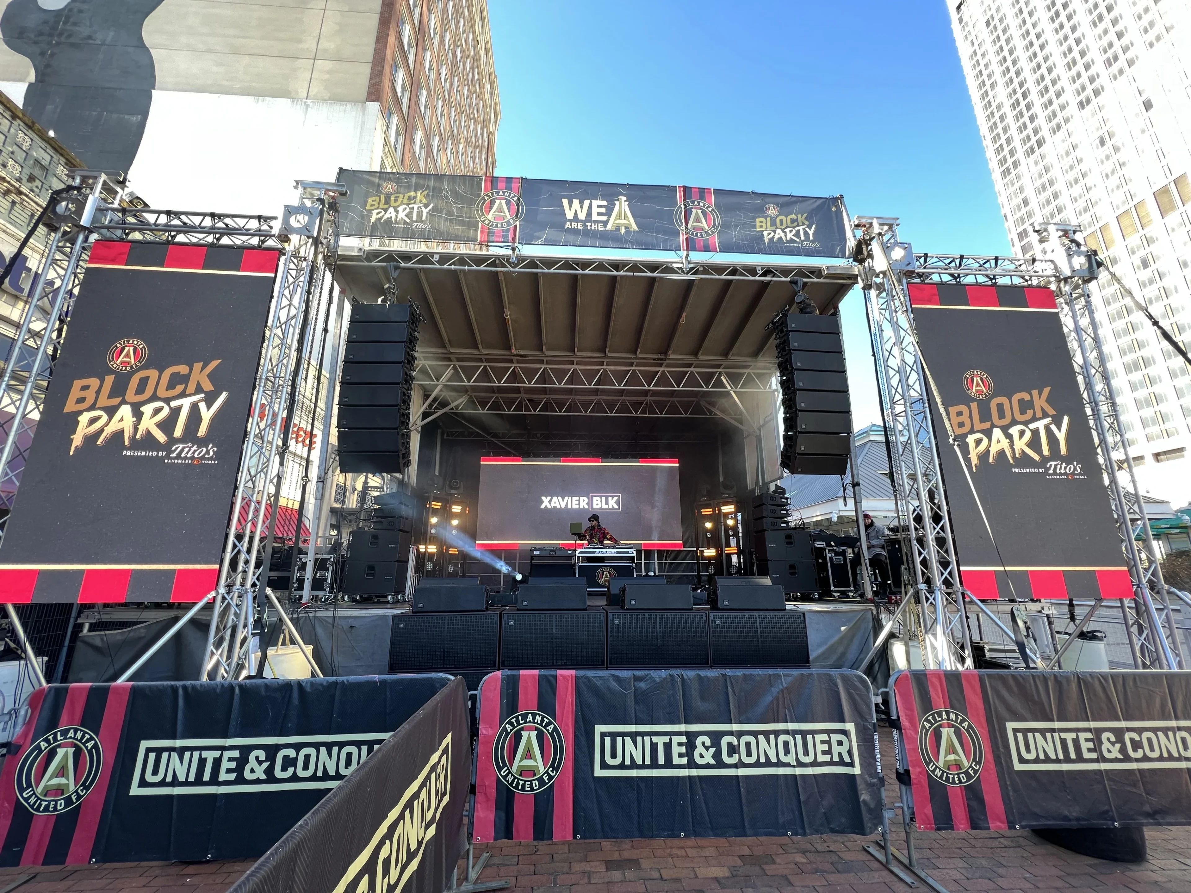 Atlanta United FC Block Party stage with branded LED panels and line array audio