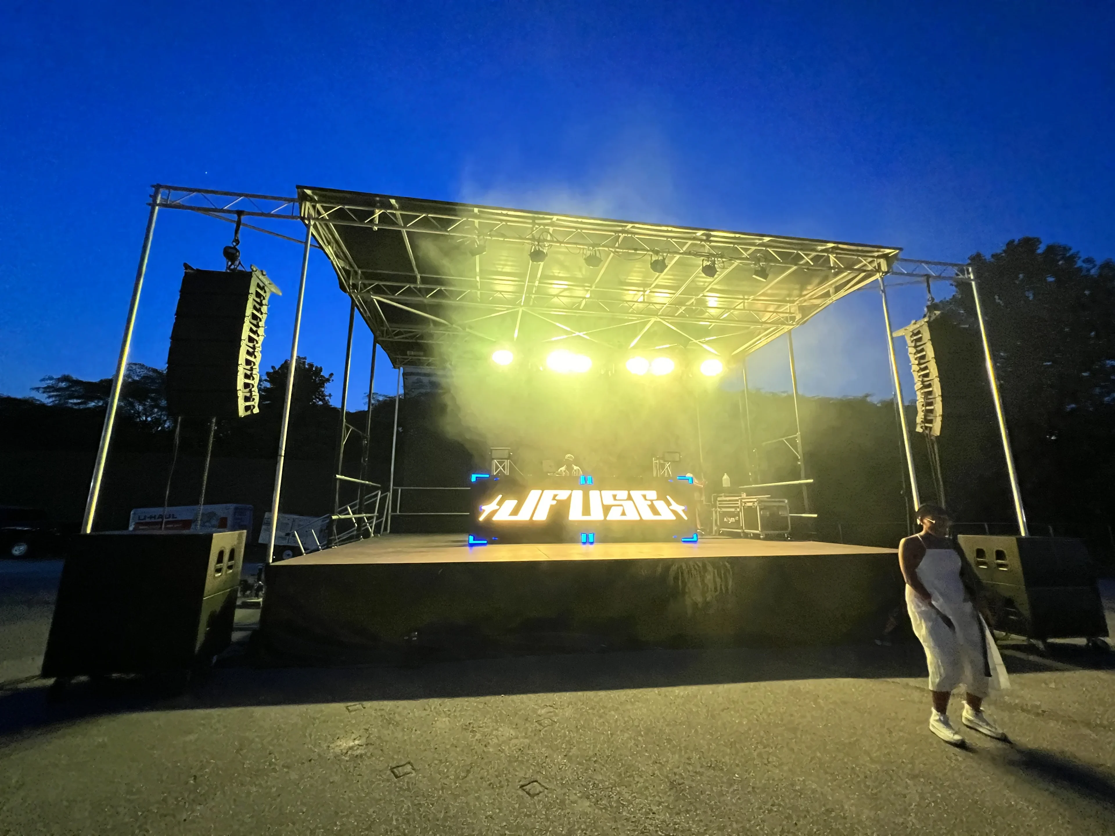 Outdoor concert truss rig with moving heads and LED fixtures