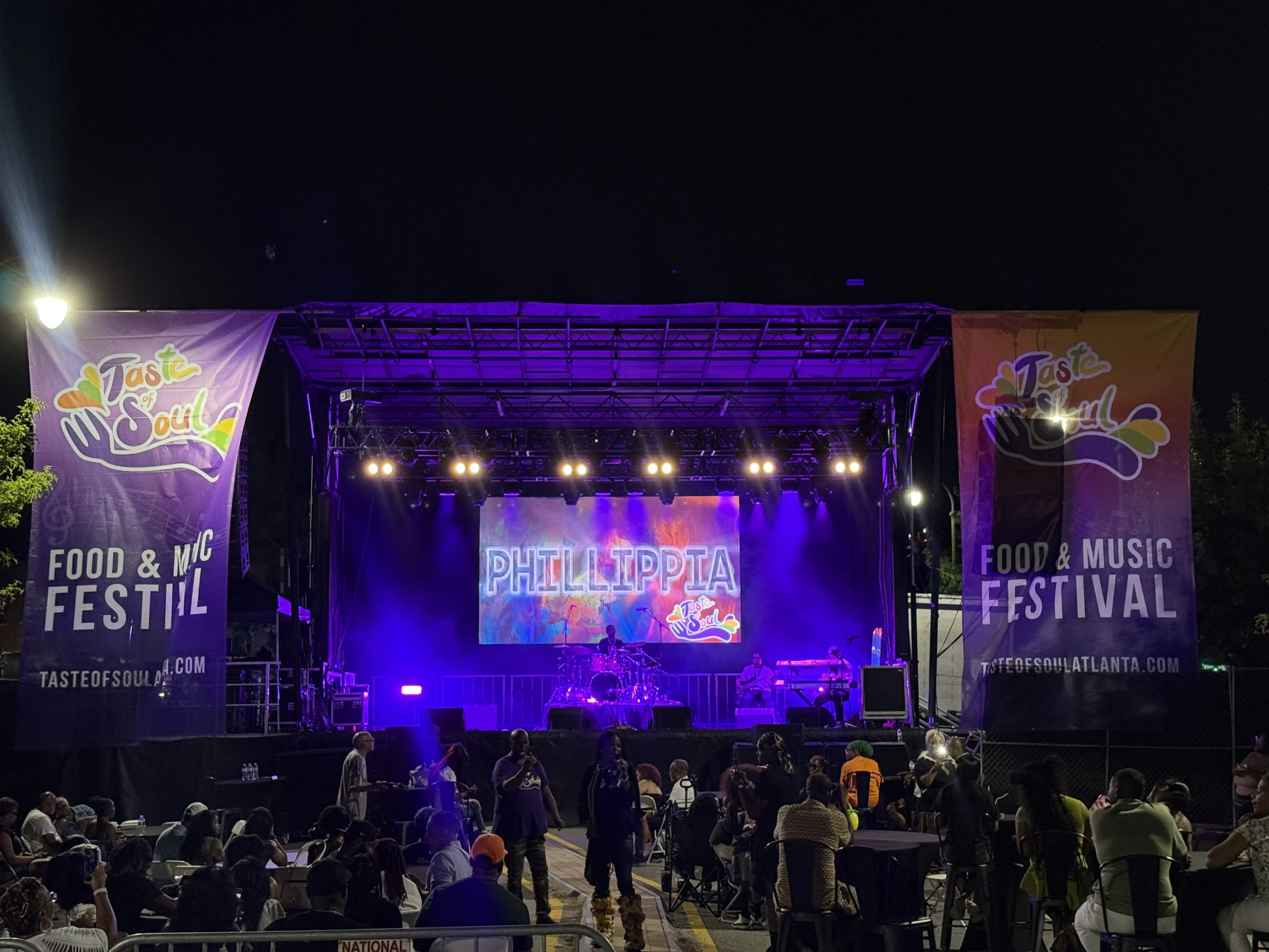Outdoor concert stage with large-scale audio and lighting rig