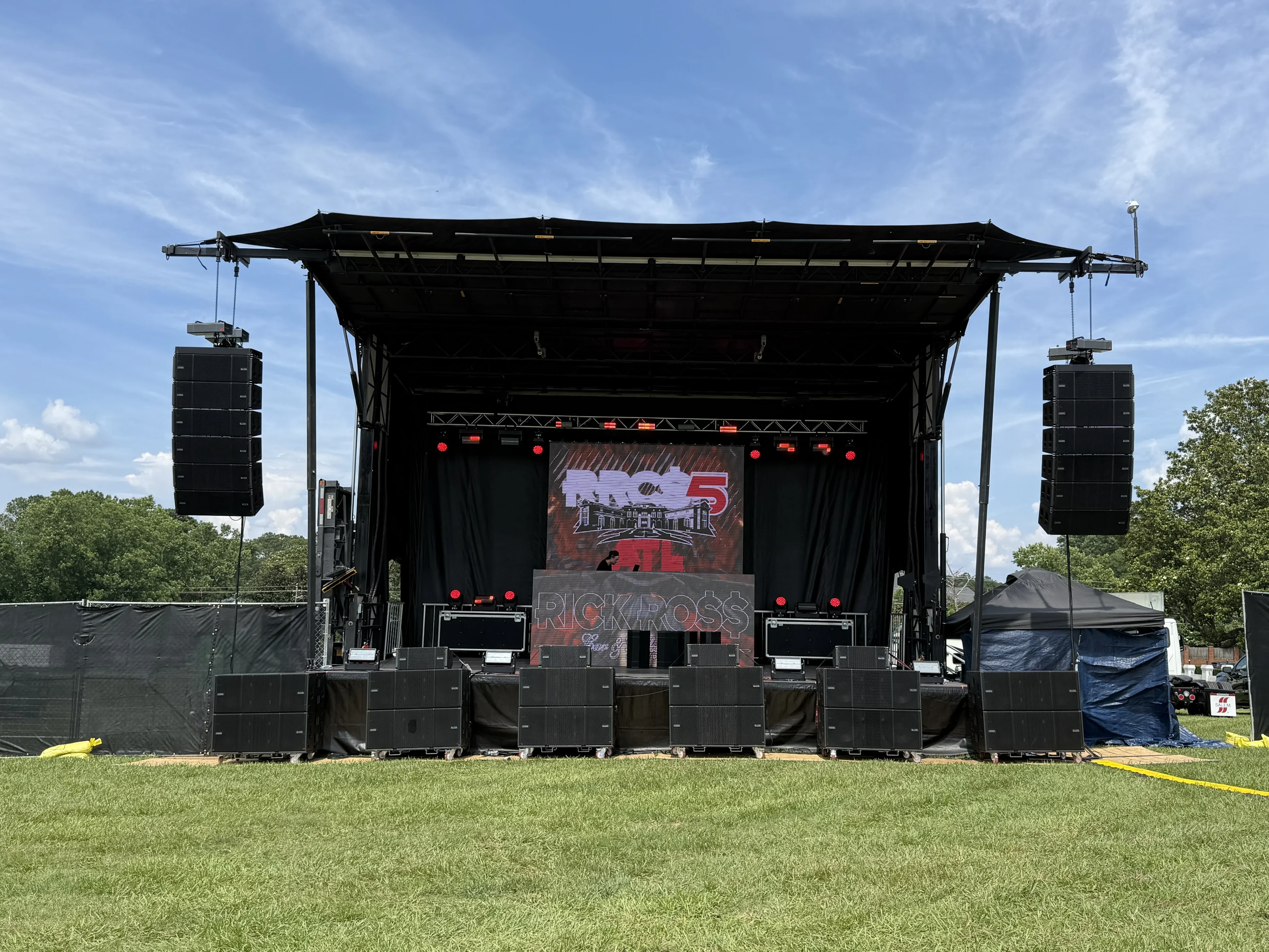 Rick Ross Car Show 2026 on a Stageline SL260 mobile stage with concert audio, lighting, and LED video wall by Rocket Productions