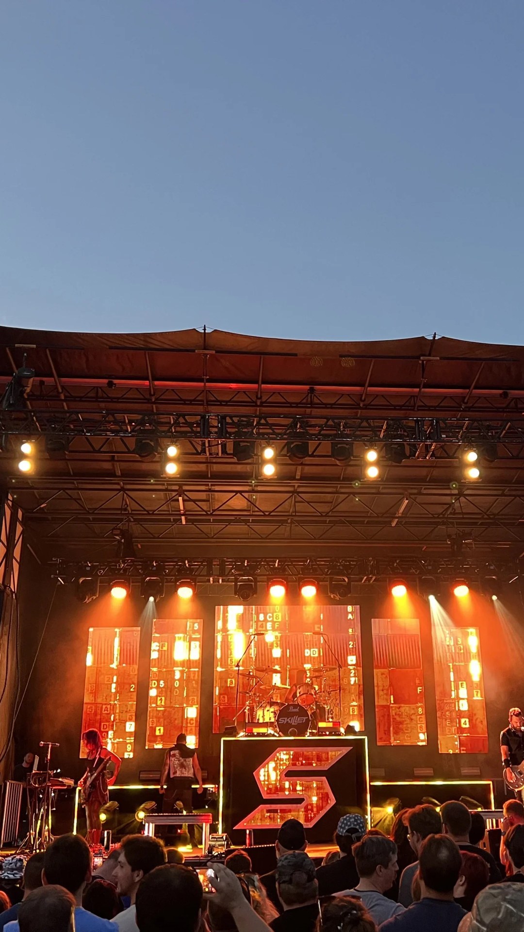 Live event production stage by Rocket Productions with concert lighting and a large IMAG LED video wall