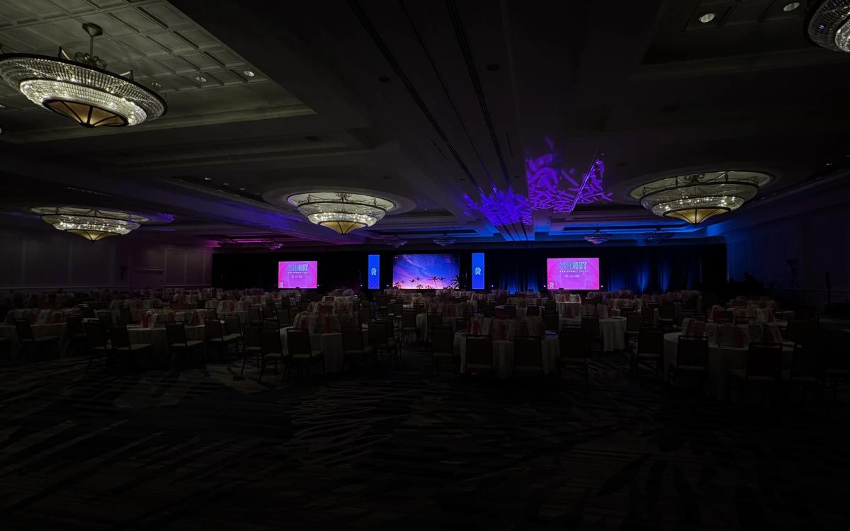 Conference hall corporate keynote with LED, audio, and staging