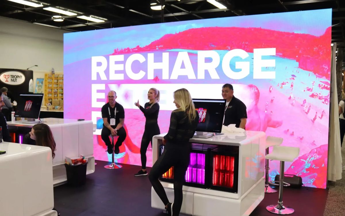 Product launch stage with dramatic spotlight production for reveal moment