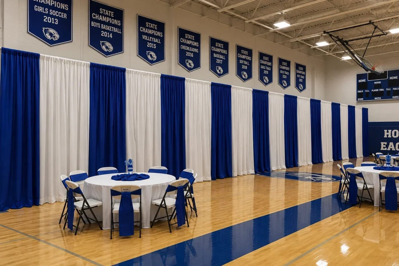Pipe and drape used as a room divider and backdrop for a school event in Atlanta.