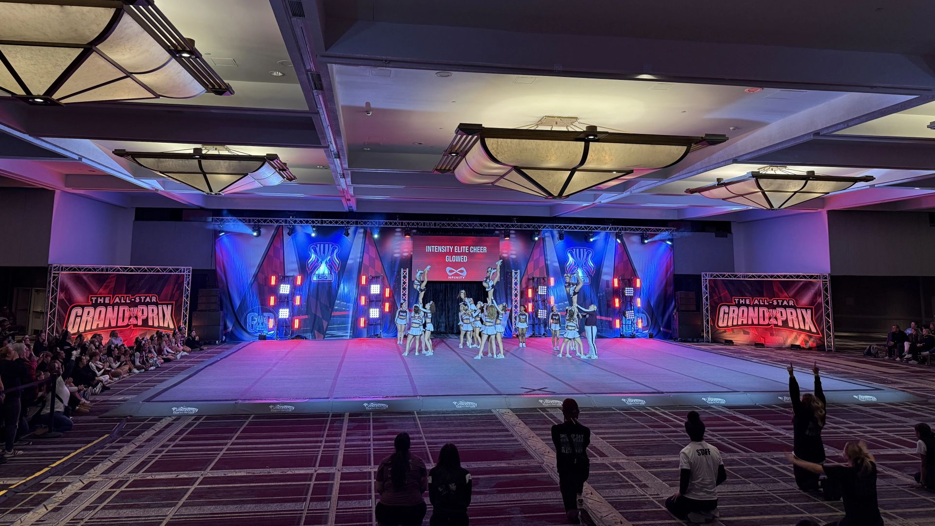 Cheer competition stage with professional production lighting
