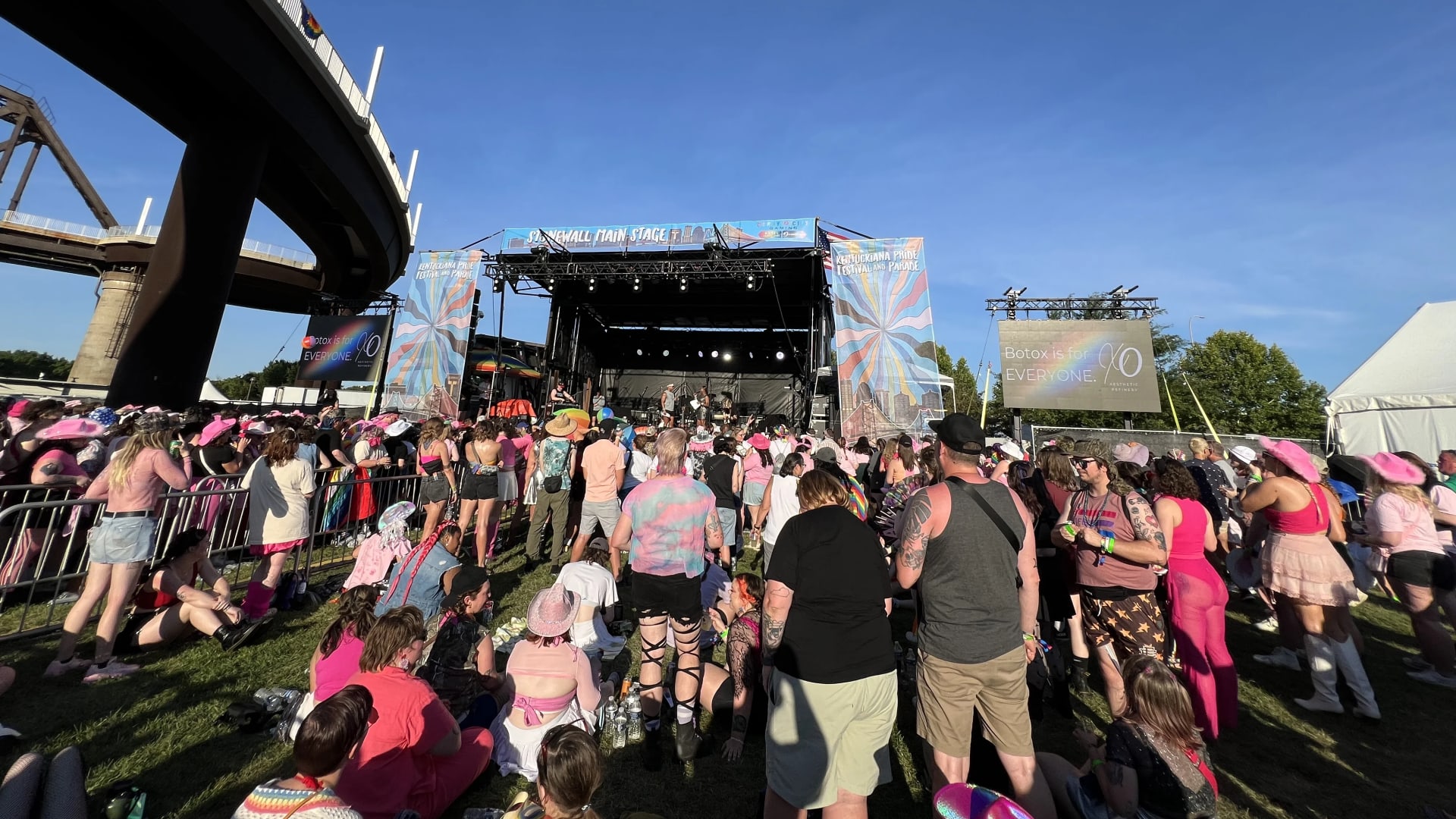 Large-scale live event production with full stage, lighting, and crowd