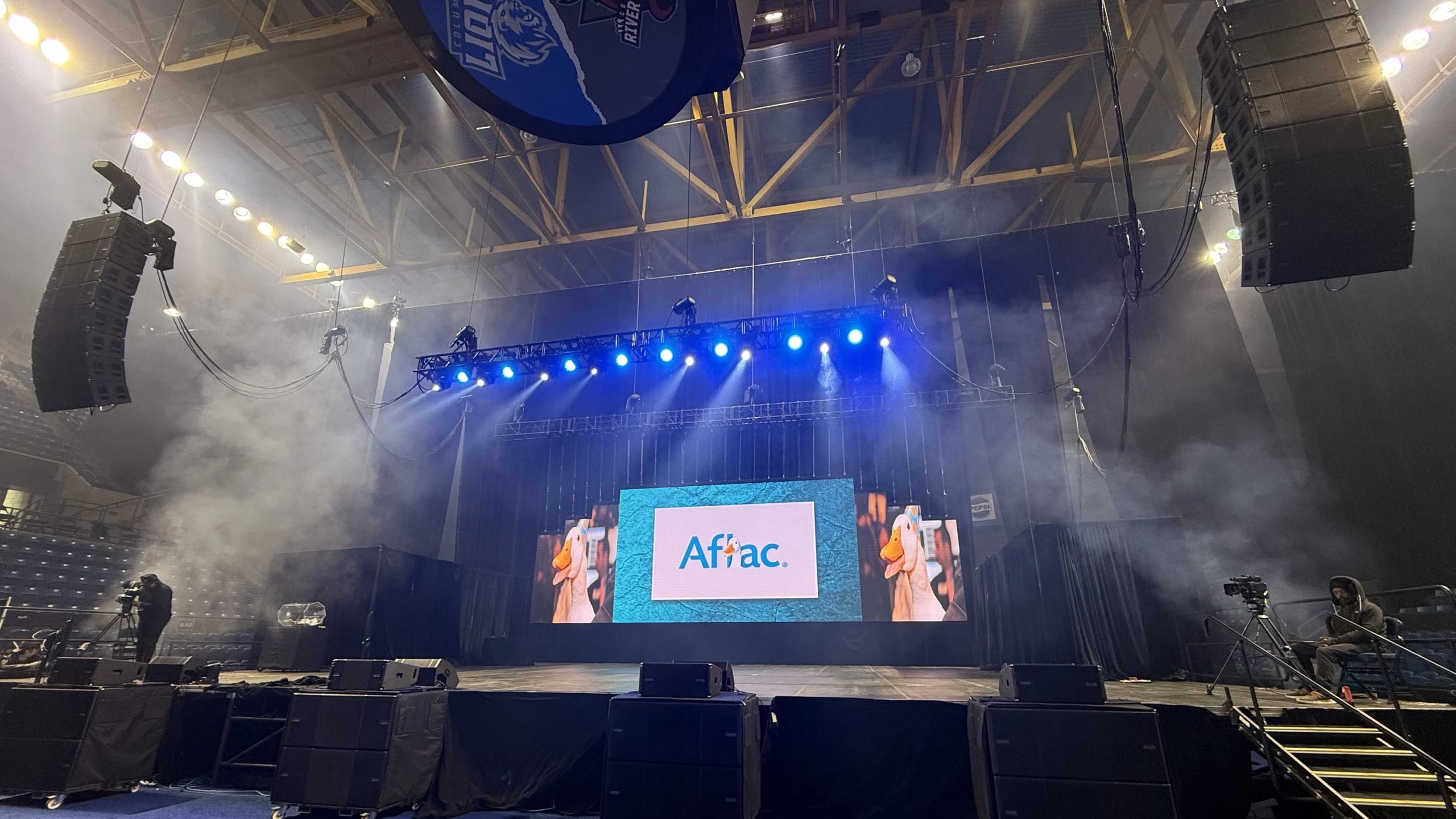 Corporate conference general session with IMAG screens, LED video wall, staging, and lighting production