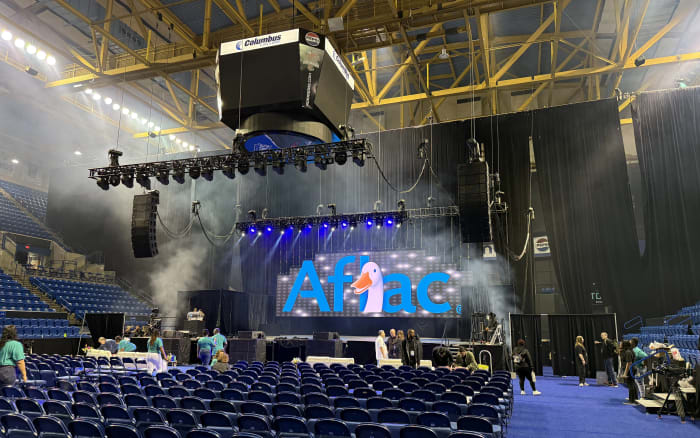 Aflac arena corporate conference with LED walls and theatrical lighting