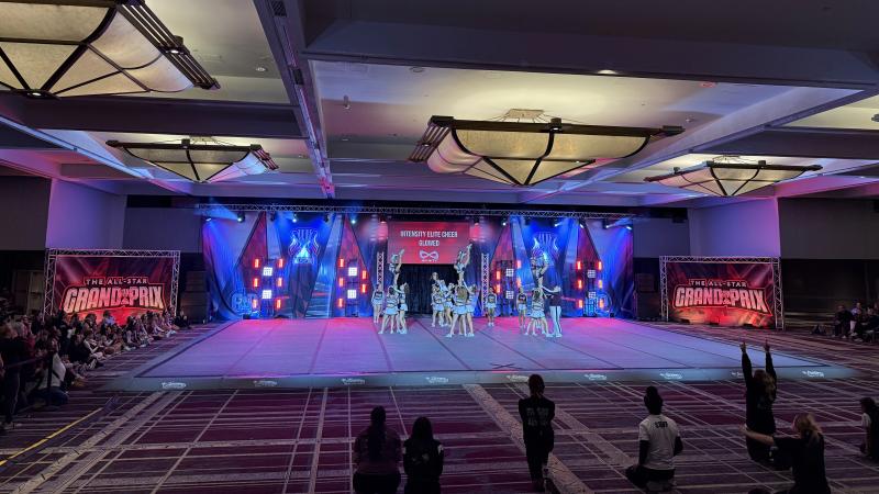 Cheer competition stage with blue wash lighting design