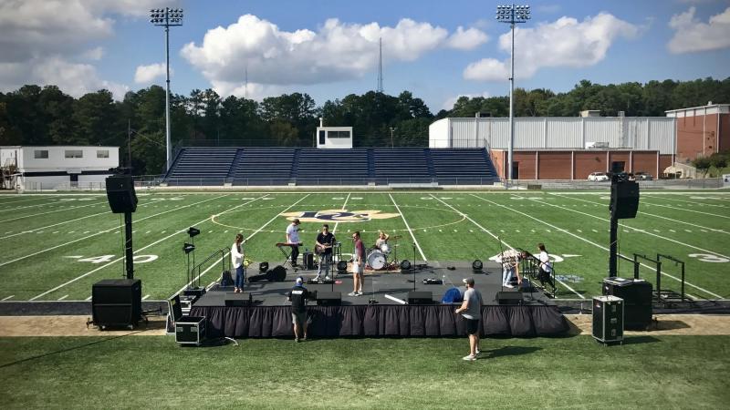 Deck staging setup for high school band performance