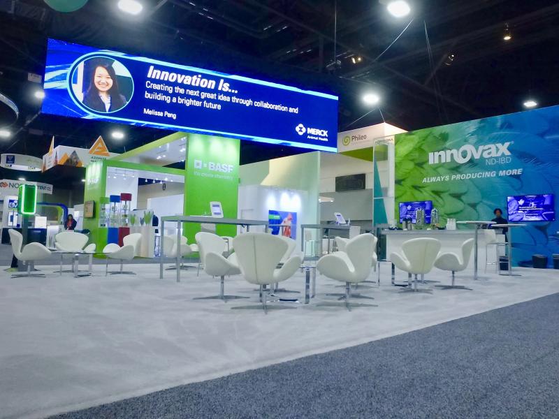 Trade show booth with professional lighting and LED display