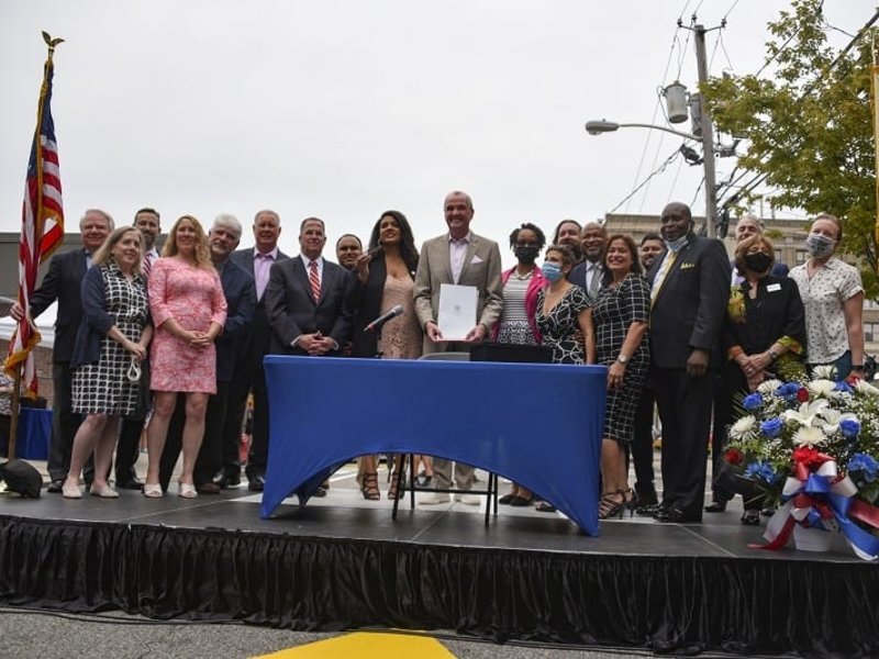 Government ceremony with dignified staging and professional lighting design