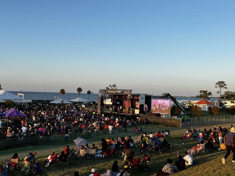 New Orleans Fried Chicken Festival main stage with crowd and food vendors