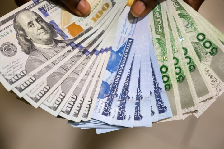 Should You Save in Dollars or Local Currency?