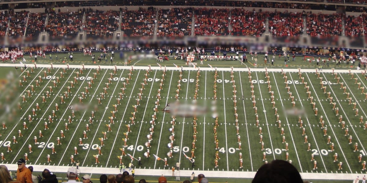 Texas marching band on the field at AT&T Stadium in Arlington during the 2009 Big 12 Championship Game