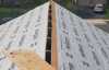 Roofsimple working on roof installing new roofing system for Umit Gurunlu 